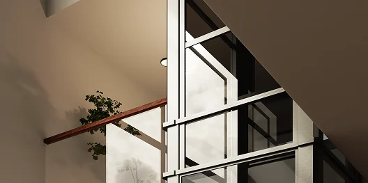 Glass tube home elevator shaft with clear polycarbonate panels seen from above a staircase landing